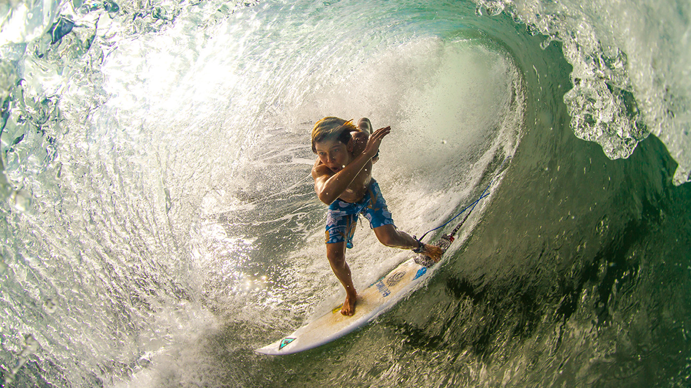 Alumnus Johnny Gonzales turns his passion for surf photography into a career