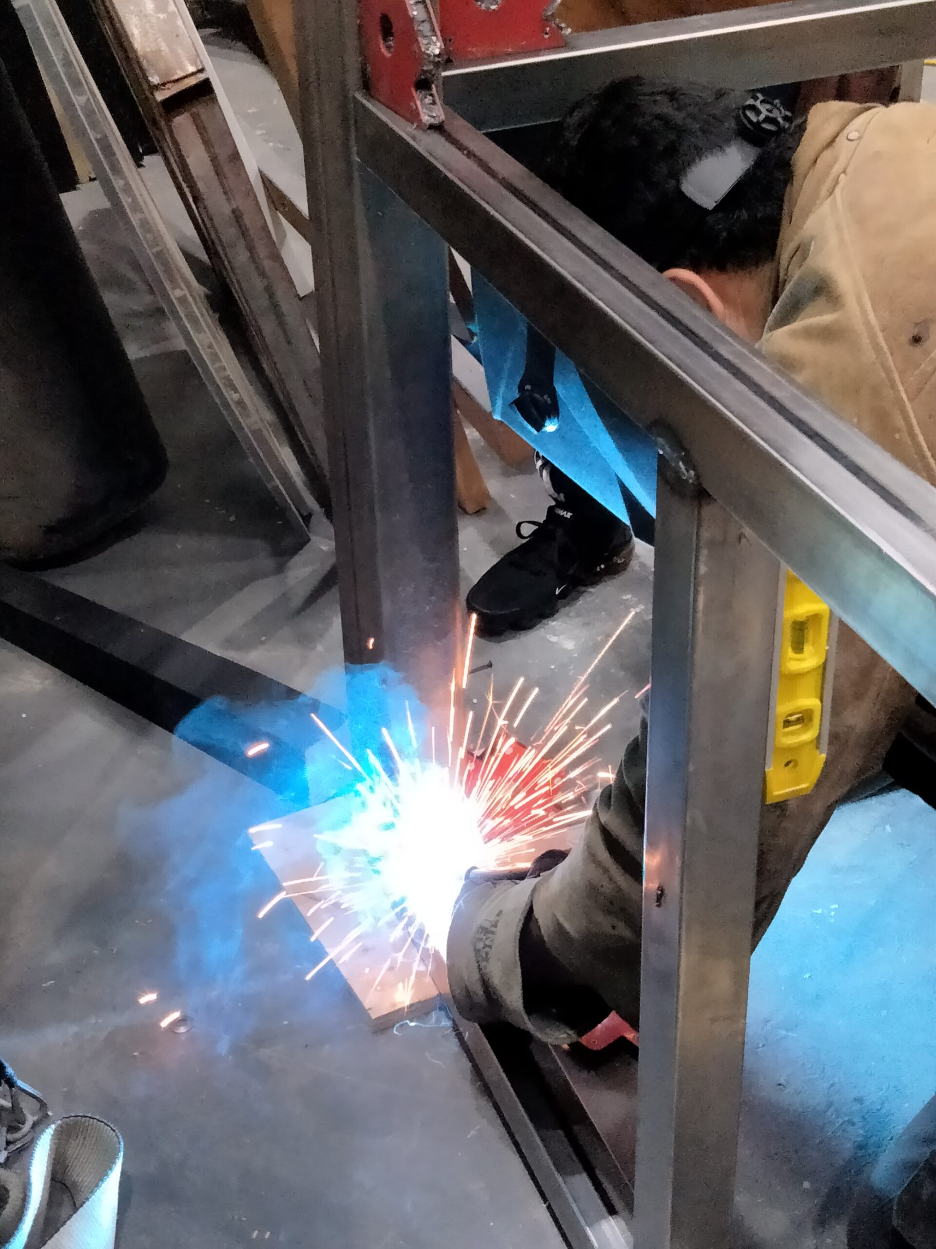 Photo of a person welding.