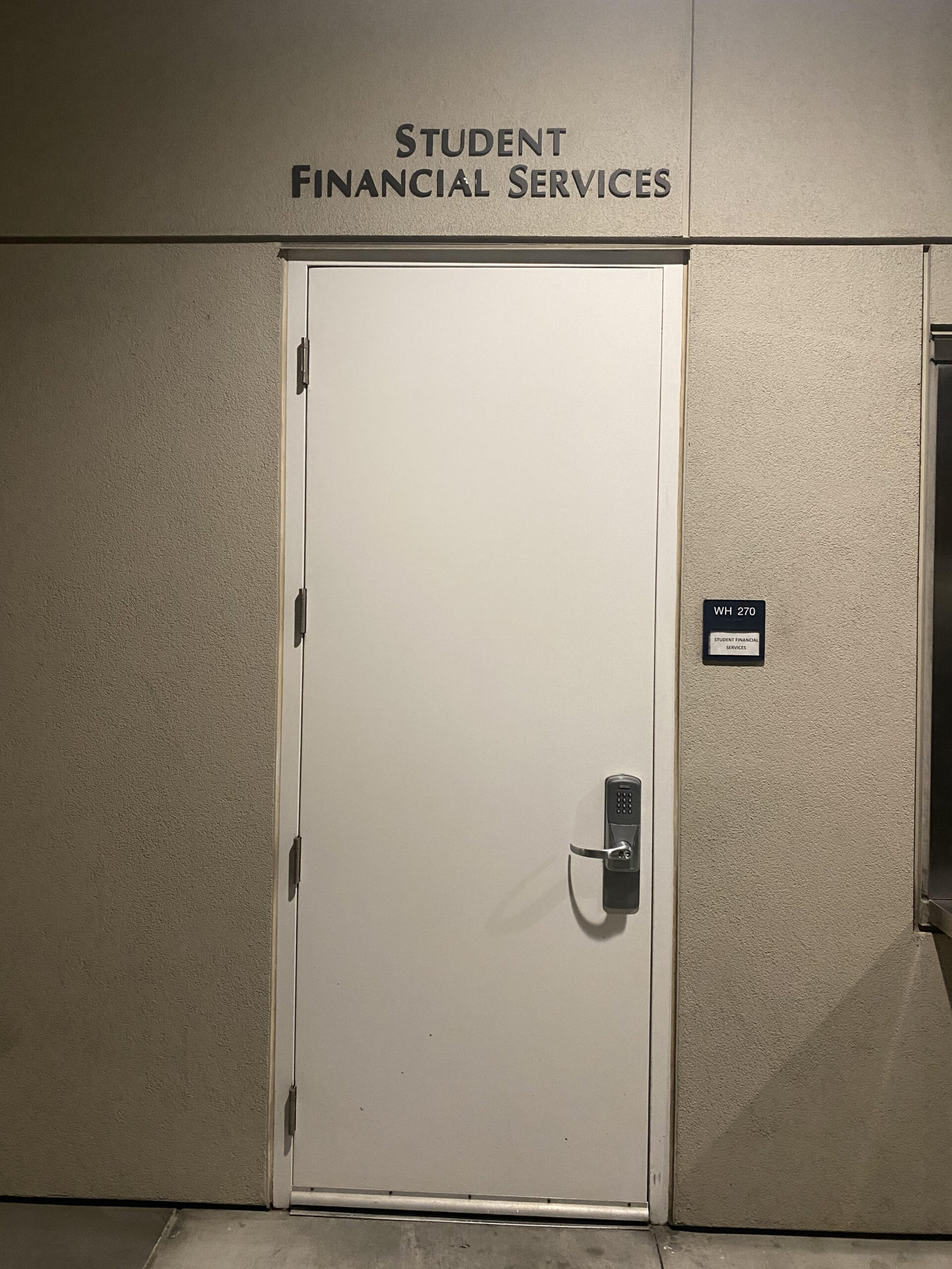 Photo of a gray door.
