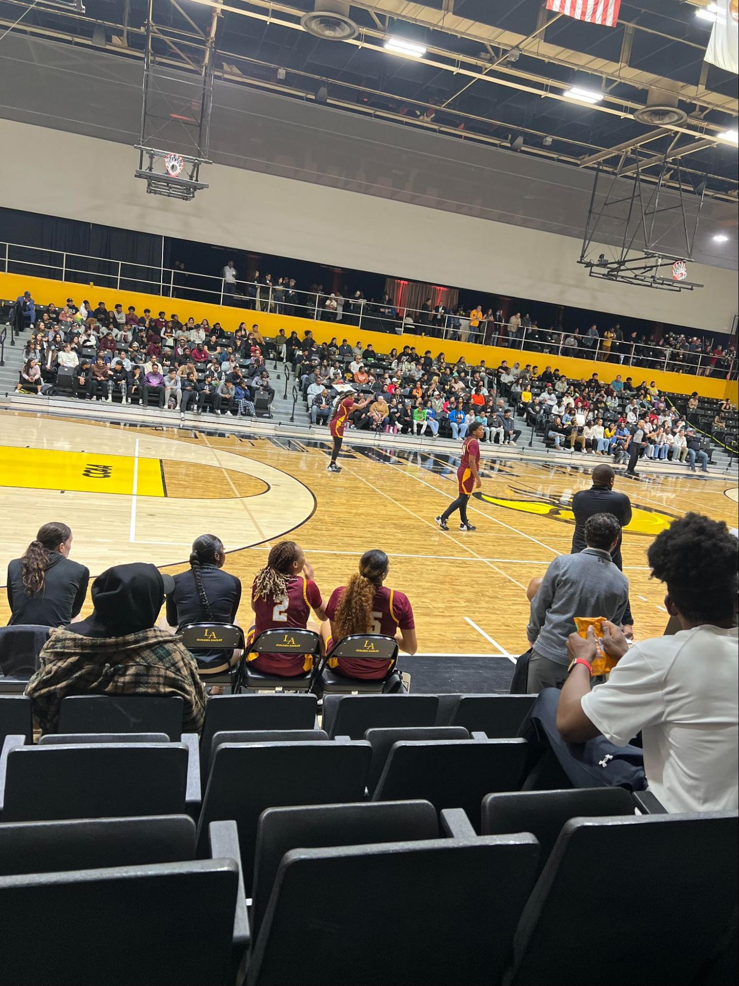 Photo of a basketball game from the stands.