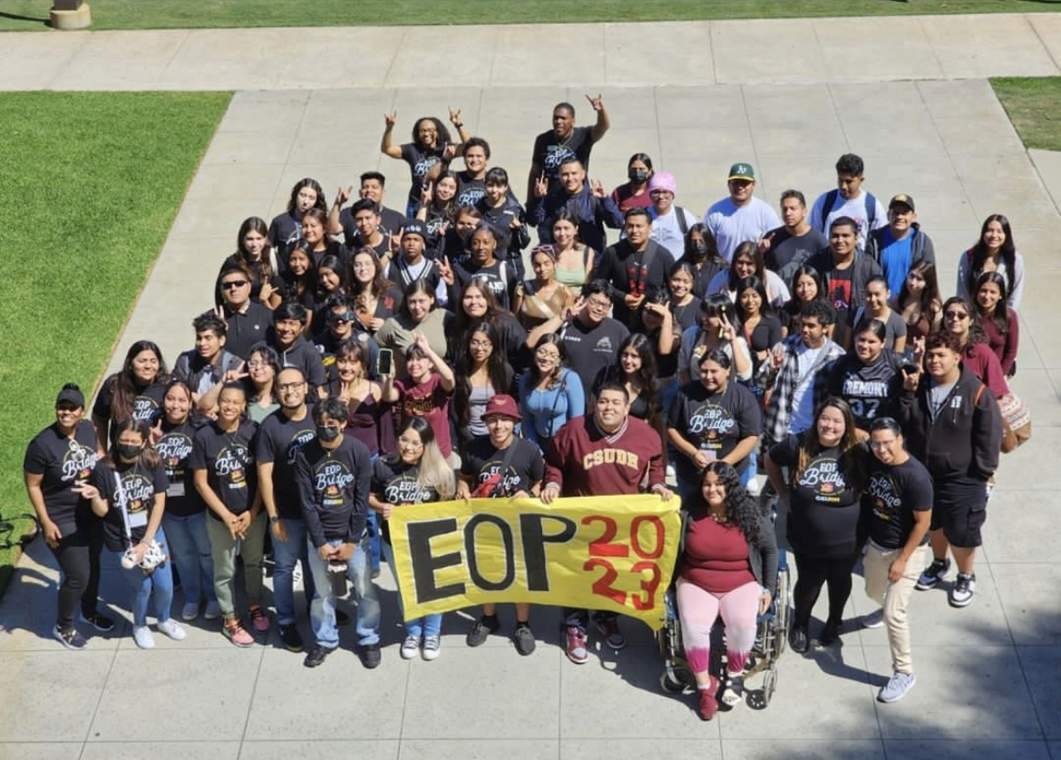 group photo of students holding a sign that says EOP 2023